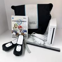 Nintendo wii console with remotes, nunchucks, carrying case, mariokart for wii