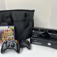 xbox 360 with kinect and carrying case, two controllers, and kinect adventures game