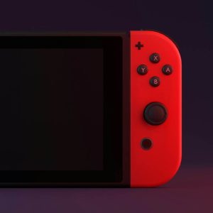 nintendo switch console with red controller