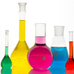laboratory glassware with colorful liquid