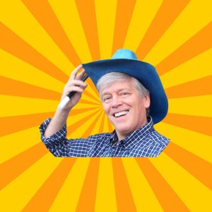 Person wearing a blue cowboy hat, smiling against a bright, radial yellow and orange background.